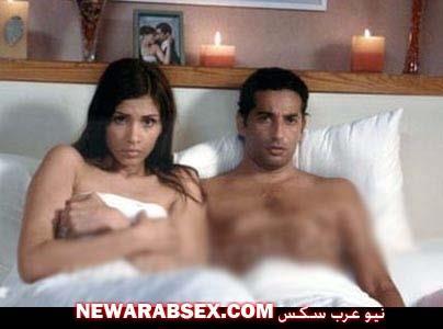 عارية تماما على السرير مع عمرو سعد